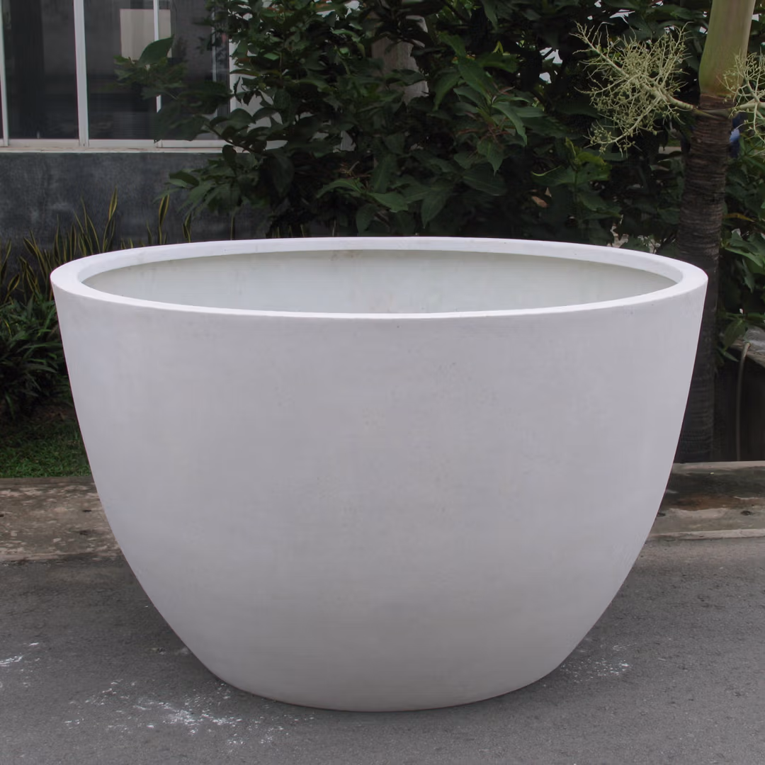 Giant Egg Planter: A Large Egg-Shaped White Planter For Plants