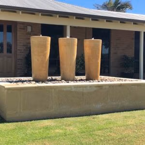 3 Tall Round Taper Urns With A Central Pump